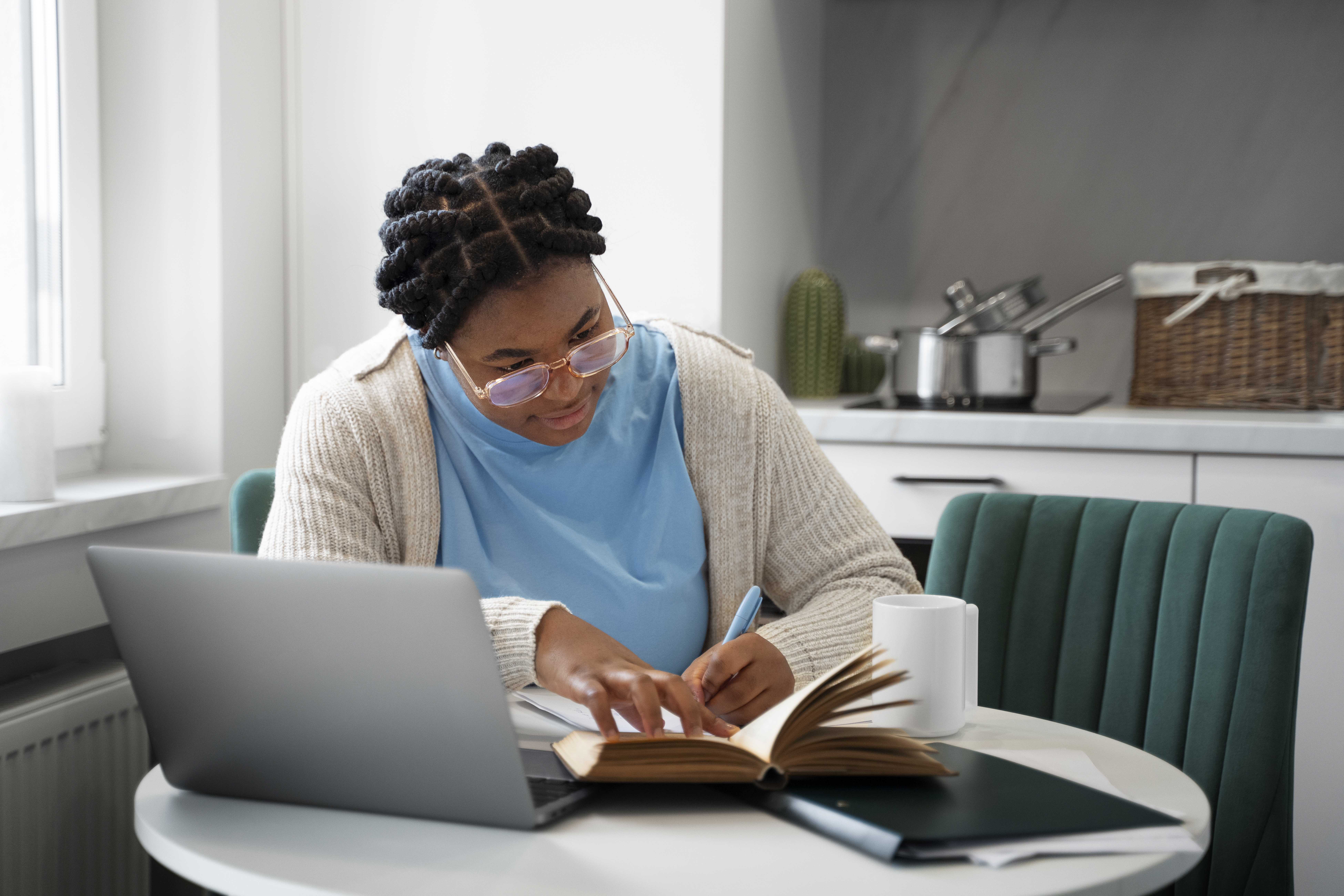 Services medium shot woman with laptop home