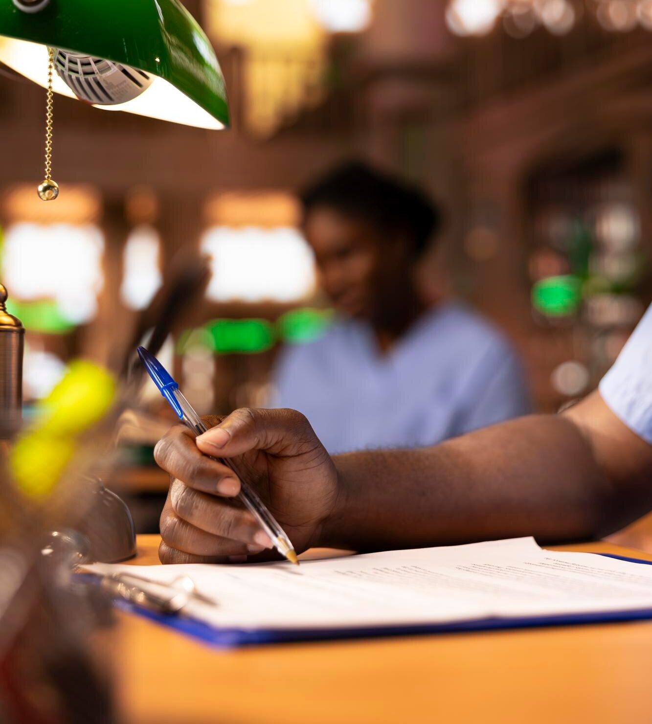 young person takes notes does his research upcoming exams 482257 117765